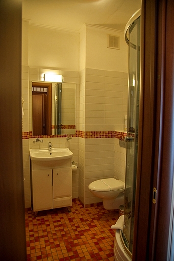 Bath room Standard Room at  Atlanta Hotel in Moscow, Russia