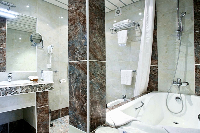 Bathroom at Junior Suite  with Hippodrome View at Bega Hotel in Moscow, Russia