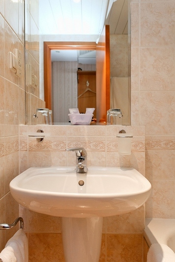 Bathroom at Superior Business Room at Belgrad Hotel in Moscow, Russia