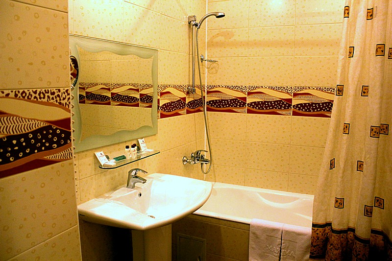 Standard Triple Room Bath Room at Maxima Zarya Hotel in Moscow, Russia