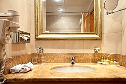 Bath room in Standard Room at Milan Hotel in Moscow, Russia
